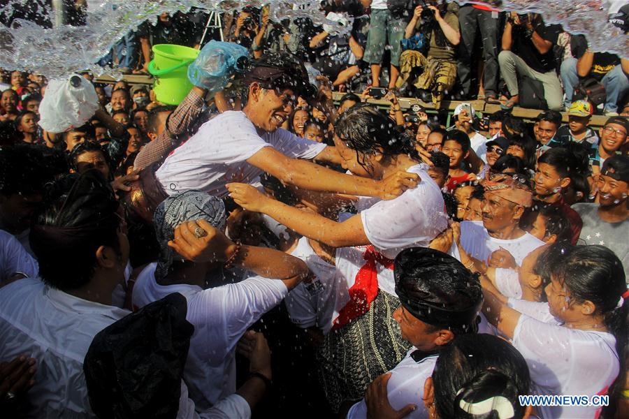 Balinese teenagers hug each other during the Kissing Festival, locally called Omed-Omedan, in Bali, Indonesia, March 29, 2017. The annual festival is held one day after the Balinese Day of Silence, or 'Nyepi'. (Xinhua/Chaniago) Balinese teenagers hug each other during the Kissing Festival, locally called Omed-Omedan, in Bali, Indonesia, March 29, 2017. The annual festival is held one day after the Balinese Day of Silence, or 'Nyepi'. (Xinhua/Chaniago)