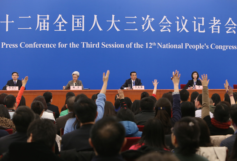 3月15日，國務(wù)院總理李克強在北京人民大會堂與中外記者見面，并回答記者提問。新華社記者 呂迅 攝