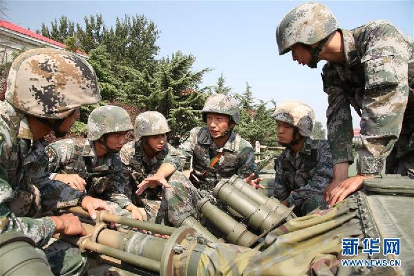 (十九大代表風(fēng)采·圖文互動(dòng))(2)“大功三連”指導(dǎo)員王金龍:矢志強(qiáng)軍的“播火者”