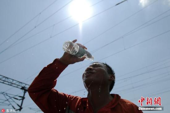 資料圖：高溫下的人。胡國林 攝 圖片來源：東方IC 版權作品 請勿轉載