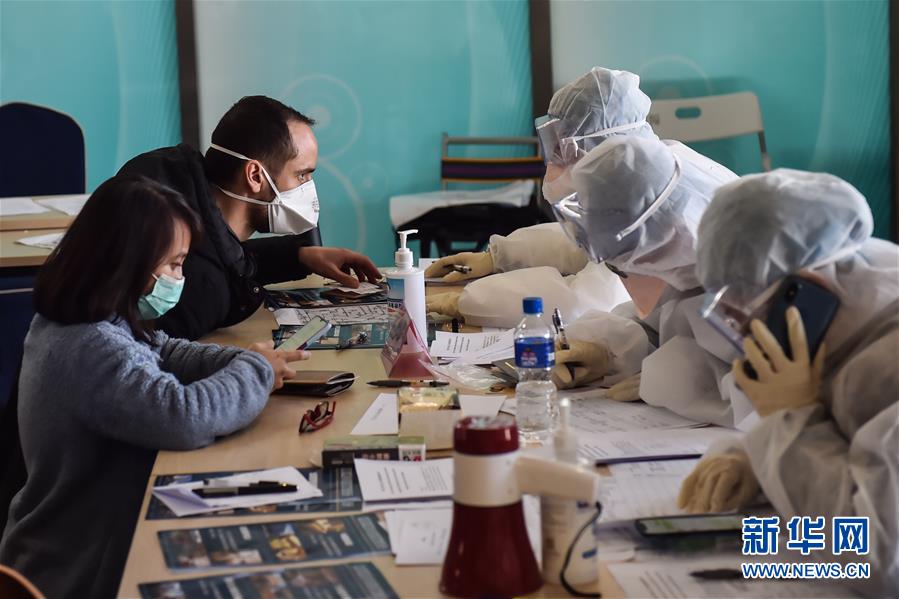 (聚焦疫情防控)(1)北京新國(guó)展入境人員轉(zhuǎn)運(yùn)集散地見(jiàn)聞