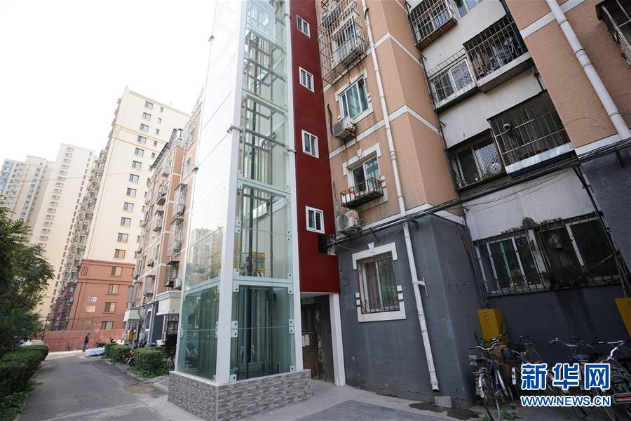 （新華全媒頭條·圖文互動）（3）88級臺階，終于不再是座“山”？——北京老舊小區(qū)加裝電梯現(xiàn)狀調(diào)查