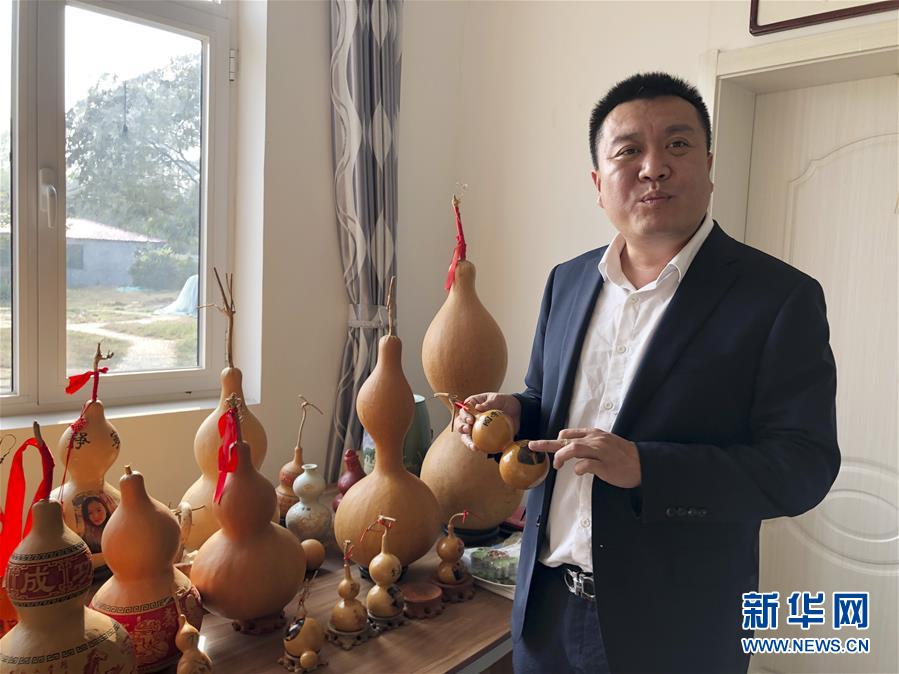 (圖文互動)(2)“葫蘆村”的“生意經(jīng)”