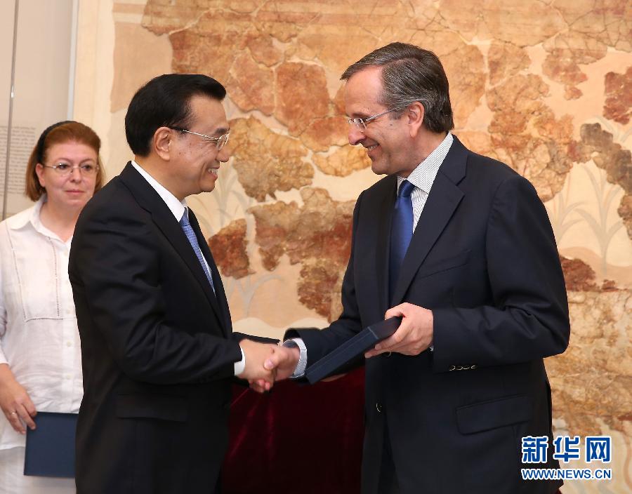 6月21日，國務(wù)院總理李克強與希臘總理薩馬拉斯共同出席希臘伊拉克利翁博物館新館開館儀式并發(fā)表講話。 新華社記者 龐興雷 攝