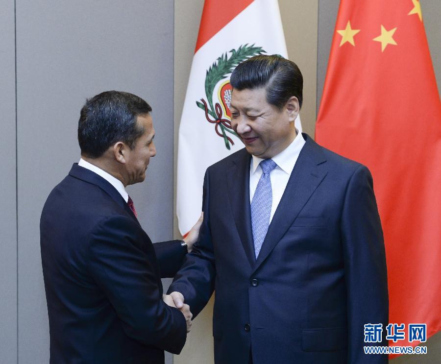 7月16日，國家主席習近平在巴西首都巴西利亞會見秘魯總統(tǒng)烏馬拉。新華社記者 劉建生 攝 