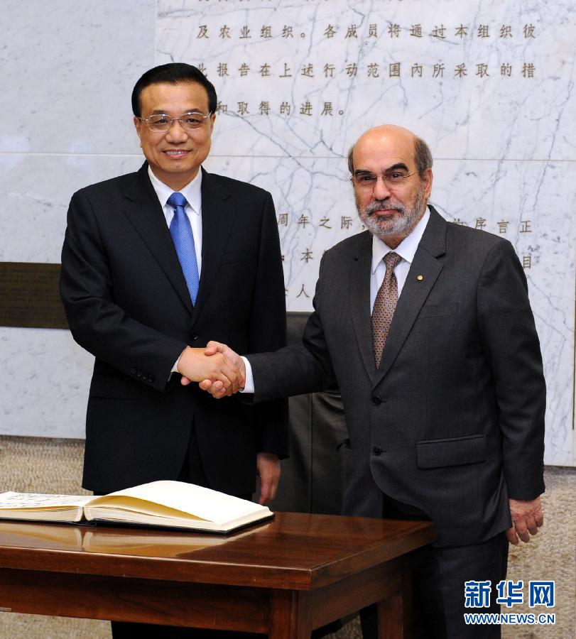 10月15日，中國國務院總理李克強在羅馬會見聯(lián)合國糧農組織總干事格拉齊亞諾。 新華社記者 饒愛民 攝