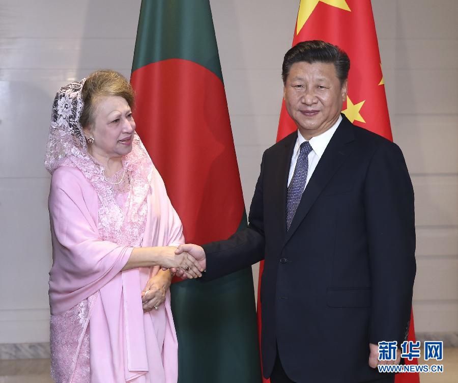 10月14日，國家主席習(xí)近平在達卡會見孟加拉國民族主義黨主席卡莉達·齊亞。  新華社記者龐興雷攝 