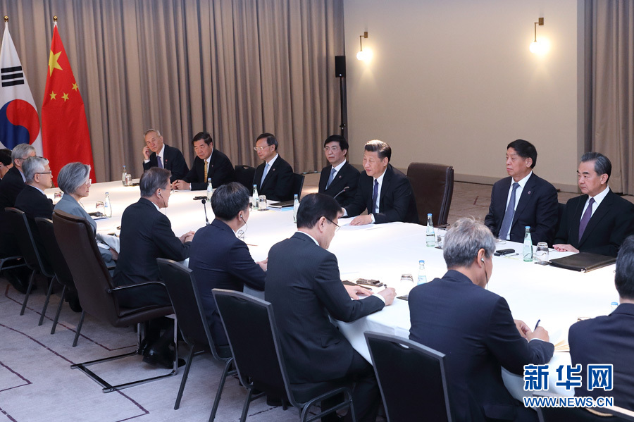 7月6日，國家主席習近平在柏林會見韓國總統(tǒng)文在寅。 新華社記者 王曄攝