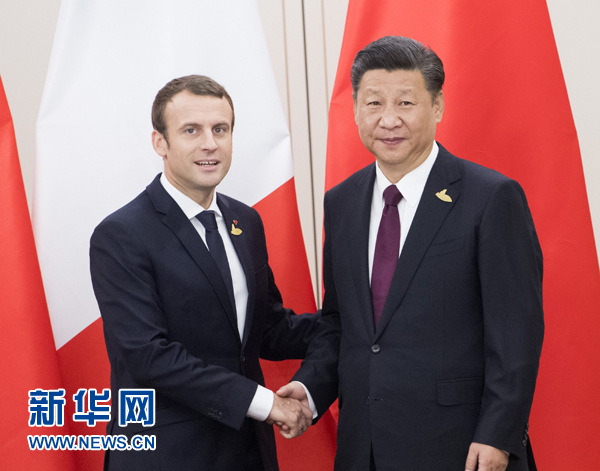 7月8日，國家主席習近平在漢堡會見法國總統(tǒng)馬克龍。新華社記者 李學仁 攝