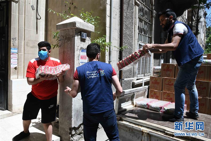 （國際疫情&middot;圖文互動）（2）通訊：疫情中，那抹笑容最難忘&mdash;&mdash;記向困難家庭發(fā)放愛心包裹的敘利亞青年志愿者